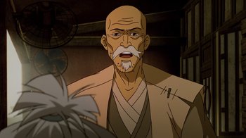 Movie still from “Mortal Kombat Legends: Snow Blind” (2022), directed by Rick Morales – An old man with a long white beard is looking at the camera; Close Up shot, Over the shoulder angle