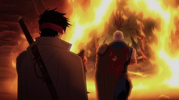 Movie still from “Mortal Kombat Legends: Snow Blind” (2022), directed by Rick Morales – Two people standing in front of a burning tree; Wide shot, High angle