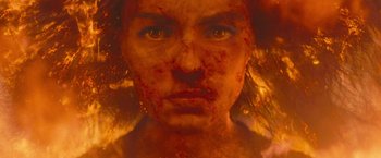 Movie still from “Mother!” (2017), directed by Darren Aronofsky – A woman's face covered in blood; Extreme Close Up shot, Overhead angle