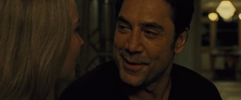 Movie still from “Mother!” (2017), directed by Darren Aronofsky – A man and a woman smiling at each other; Close Up shot, Over the shoulder angle