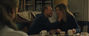 Movie still from “Mother!” (2017), directed by Darren Aronofsky – An older man and a younger woman sitting at a dinner table; Close Up shot, Over the shoulder angle