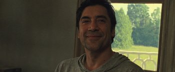 Movie still from “Mother!” (2017), directed by Darren Aronofsky – A person smiling for the camera; Close Up shot, Low angle