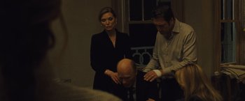 Movie still from “Mother!” (2017), directed by Darren Aronofsky – A man and two women standing next to each other; Medium shot, Over the shoulder angle