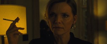 Movie still from “Mother!” (2017), directed by Darren Aronofsky – A person wearing a black shirt; Close Up shot, Over the shoulder angle