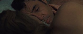 Movie still from “Mother!” (2017), directed by Darren Aronofsky – A person laying in a bed; Close Up shot, Over the shoulder angle