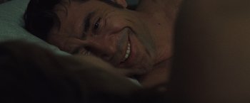 Movie still from “Mother!” (2017), directed by Darren Aronofsky – A man's face as he lays in bed; Extreme Close Up shot, Overhead angle