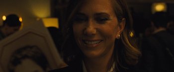 Movie still from “Mother!” (2017), directed by Darren Aronofsky – A person smiling for the camera; Close Up shot, Over the shoulder angle