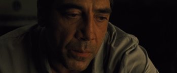 Movie still from “Mother!” (2017), directed by Darren Aronofsky – A man's face in the dark; Close Up shot, High angle