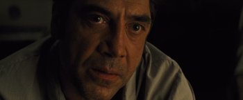 Movie still from “Mother!” (2017), directed by Darren Aronofsky – A man's face in the dark; Close Up shot, Over the shoulder angle