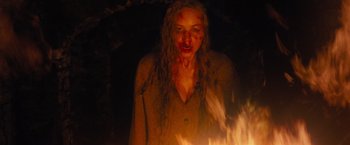 Movie still from “Mother!” (2017), directed by Darren Aronofsky – A woman with blood all over her face; Close Up shot, High angle