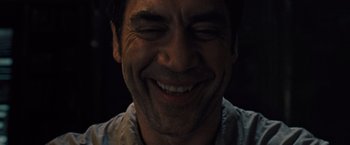 Movie still from “Mother!” (2017), directed by Darren Aronofsky – A man smiling with his eyes closed; Close Up shot, Overhead angle