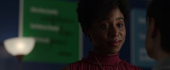 Movie still from “Mr. Harrigan's Phone” (2022), directed by John Lee Hancock – A person wearing a red shirt; Close Up shot, Over the shoulder angle