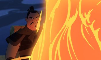 Movie still from “Mulan” (1998), directed by Tony Bancroft – An image of an animated character in front of a fire; Medium shot, Over the shoulder angle