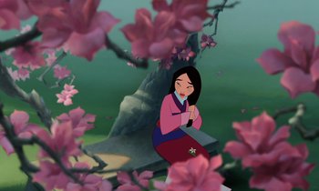 Movie still from “Mulan” (1998), directed by Tony Bancroft – Mulan sitting in front of a tree with pink flowers; Medium shot, Over the shoulder angle