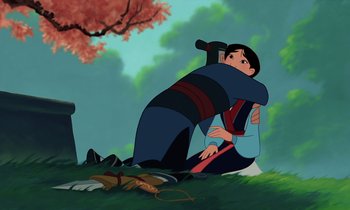 Movie still from “Mulan” (1998), directed by Tony Bancroft – An animated scene of mulan hugging a dog; Wide shot, Over the shoulder angle