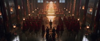 Movie still from “Mulan” (2020), directed by Niki Caro – A large group of people in a large room; Extreme Wide shot, High angle