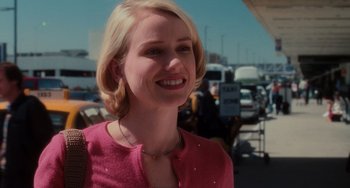 Movie still from “Mulholland Drive” (2001), directed by David Lynch – A woman with blonde hair wearing a pink jacket; Close Up shot, Over the shoulder angle