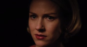 Movie still from “Mulholland Drive” (2001), directed by David Lynch – A woman's face in the dark; Close Up shot, Over the shoulder angle