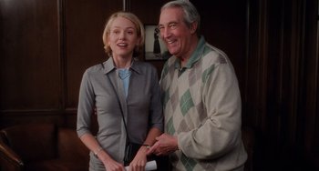 Movie still from “Mulholland Drive” (2001), directed by David Lynch – A man and a woman standing next to each other; Medium shot, Low angle