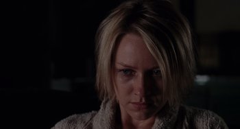 Movie still from “Mulholland Drive” (2001), directed by David Lynch – A person with short blonde hair; Close Up shot, Low angle