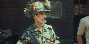 Movie still from “Mumbai Mafia: Police vs the Underworld” (2023), directed by Raaghav Dar – A man in a military uniform with a hat on his head; Close Up shot, High angle