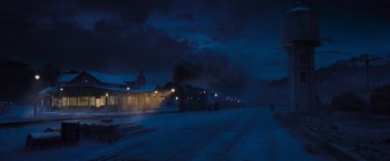 Movie still from “Murder on the Orient Express” (2017), directed by Kenneth Branagh – A train on a train track at night time; Extreme Wide shot, Low angle
