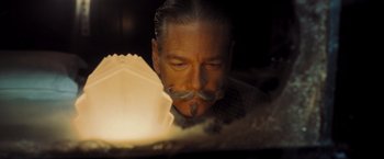 Movie still from “Murder on the Orient Express” (2017), directed by Kenneth Branagh – A person with a mustache; Close Up shot, Low angle
