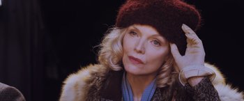 Movie still from “Murder on the Orient Express” (2017), directed by Kenneth Branagh – A person wearing a hat; Close Up shot, Low angle