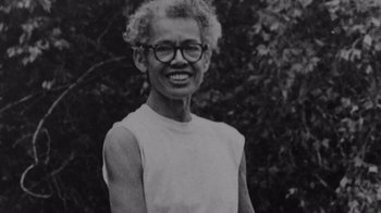 Movie still from “My Name Is Pauli Murray” (2021), directed by Betsy West – An old black and white photo of a person smiling; Close Up shot, Low angle