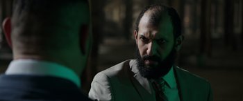 Movie still from “My Spy” (2020), directed by Peter Segal – A man with a goatee and a beard; Close Up shot, Over the shoulder angle