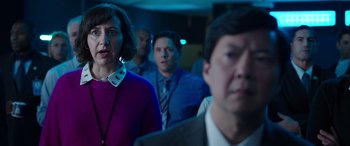 Movie still from “My Spy” (2020), directed by Peter Segal – A group of men and a woman standing in a room; Medium shot, Over the shoulder angle