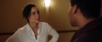 Movie still from “My Spy” (2020), directed by Peter Segal – A woman in a white shirt is talking to a man in a suit; Close Up shot, Over the shoulder angle