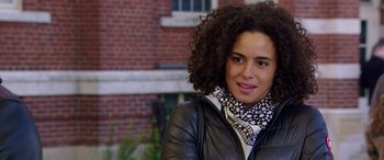 Movie still from “My Spy” (2020), directed by Peter Segal – A woman in a black jacket and a scarf; Close Up shot, Over the shoulder angle