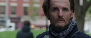 Movie still from “My Spy” (2020), directed by Peter Segal – A person wearing a scarf; Close Up shot, Low angle