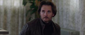 Movie still from “My Spy” (2020), directed by Peter Segal – A person wearing a leather jacket; Close Up shot, Over the shoulder angle