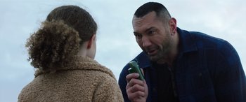 Movie still from “My Spy” (2020), directed by Peter Segal – A man and a little girl talking to each other; Close Up shot, Over the shoulder angle