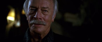 Movie still from “National Treasure” (2004), directed by Jon Turteltaub – An older man with a mustache and a goatee; Close Up shot, Low angle