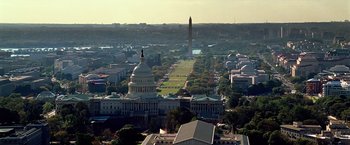 Movie still from “National Treasure” (2004), directed by Jon Turteltaub – An aerial view of the washington monument and the capitol building; Extreme Wide shot, High angle