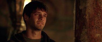 Movie still from “National Treasure” (2004), directed by Jon Turteltaub – A person looking up at the sky; Close Up shot, Over the shoulder angle