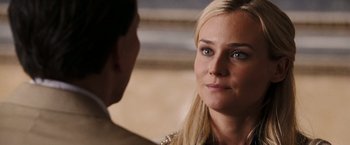 Movie still from “National Treasure: Book of Secrets” (2007), directed by Jon Turteltaub – A person talking to another person; Close Up shot, Over the shoulder angle