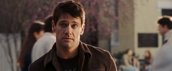 Movie still from “National Treasure: Book of Secrets” (2007), directed by Jon Turteltaub – A person wearing a brown shirt; Close Up shot, Over the shoulder angle