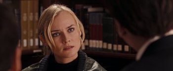 Movie still from “National Treasure: Book of Secrets” (2007), directed by Jon Turteltaub – A person wearing a leather jacket; Close Up shot, Over the shoulder angle