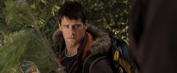 Movie still from “National Treasure: Book of Secrets” (2007), directed by Jon Turteltaub – A person with a backpack; Close Up shot, Over the shoulder angle