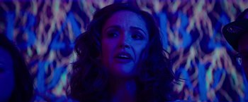 Movie still from “Neighbors” (2014), directed by Nicholas Stoller – A person in a dark room; Close Up shot, Over the shoulder angle