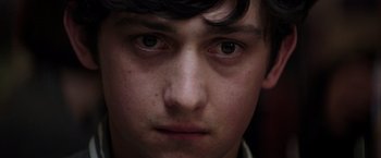 Movie still from “Neighbors” (2014), directed by Nicholas Stoller – A young man's face; Close Up shot, High angle