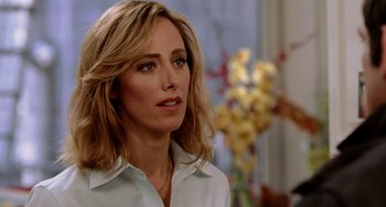 Movie still from “Night at the Museum” (2006), directed by Shawn Levy – A person wearing a white shirt; Close Up shot, Over the shoulder angle