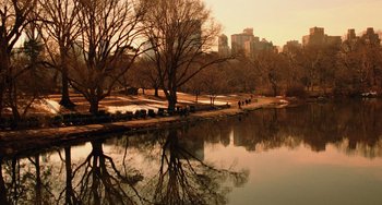 Movie still from “Night at the Museum” (2006), directed by Shawn Levy – People walking along a path near a body of water; Extreme Wide shot, High angle