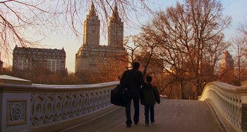 Movie still from “Night at the Museum” (2006), directed by Shawn Levy – Two people are walking on a bridge in a city; Wide shot, Over the shoulder angle