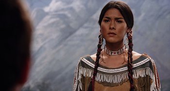 Movie still from “Night at the Museum” (2006), directed by Shawn Levy – A woman in native american clothing with braids; Close Up shot, Over the shoulder angle