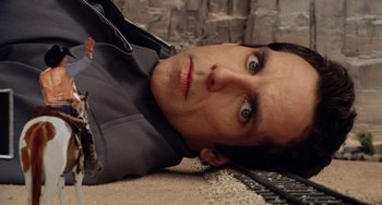 Movie still from “Night at the Museum” (2006), directed by Shawn Levy – A person laying on the ground; Close Up shot, Overhead angle
